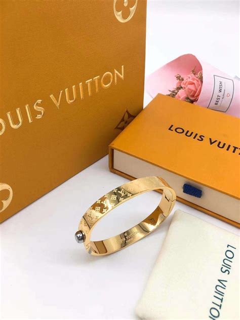 lv monogram gold bracelet|louis vuitton monogram cuff bracelet.